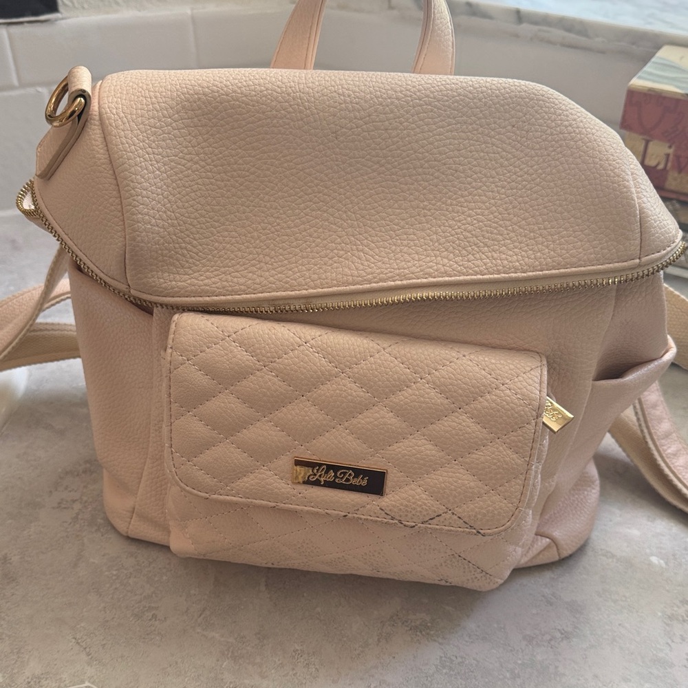 Pink Quilted Leather Backpack